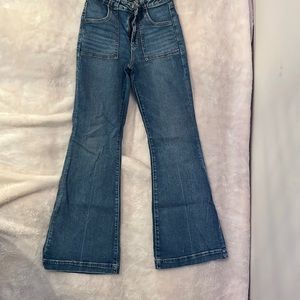 Barely wore. Tight on the thighs and boot cut ankles. Extremely flattering